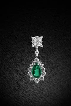 Earring on black Stock Photos