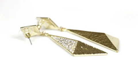 Earring rotating on white background Stock Footage 40479808