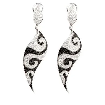 Earring on white Stock Photos