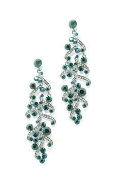 Earrings with emerald   on a white background Stock Photos