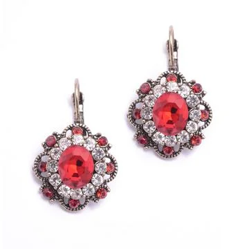 Earrings with ruby isolated on white Stock Photos