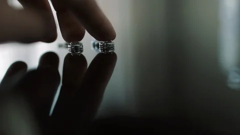 Earrings On A Smooth Surface. Stock-Footage 107410962