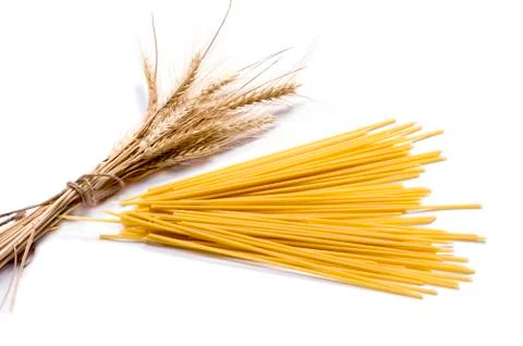 Ears of wheat and linking of spaghetti, isolate Stock Photos