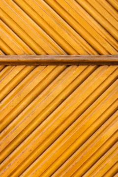 Earshaped pattern made from wood in a fine door Stock Photos