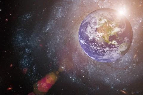 Earth and galaxy. Elements of this image furnished by NASA. Earth and gala... 库存照片
