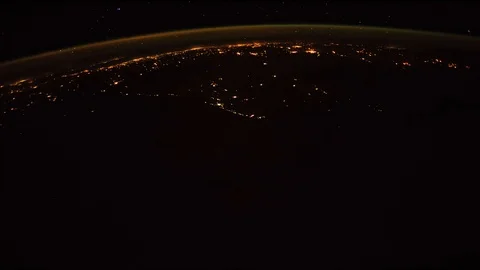 Earth and Italy from ISS. Elements of this video furnished by NASA. Italy lit Stock Footage 102914352