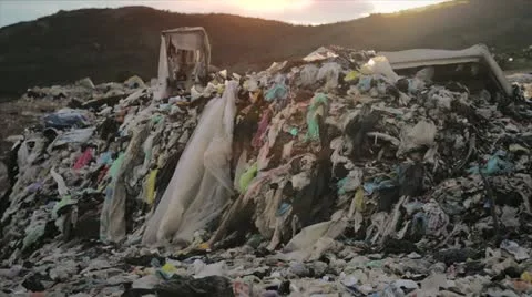 Earth Contamination Garbage Dump panning Stock Footage 12163492