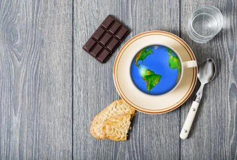 Earth globe in a cup of coffee, elements of this image furnished by nasa Stock Photos