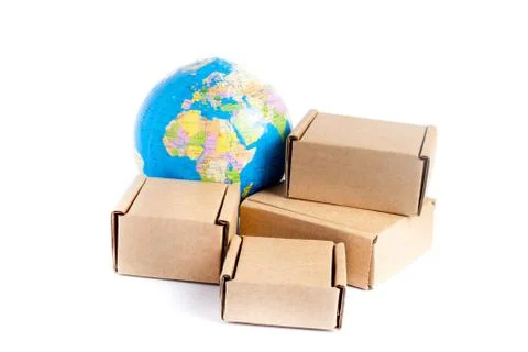 Earth globe is surrounded by boxes isolated on white background. Global busin Stock Photos