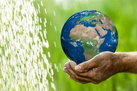 Earth in hands Stock Photos