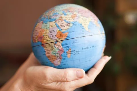 The earth in hands Stock Photos