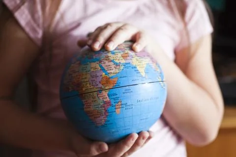 The earth in hands Stock Photos