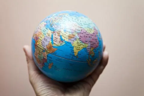 The earth in hands Stock Photos