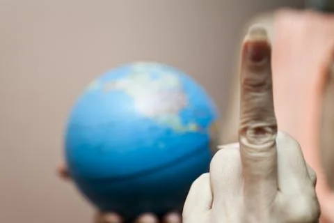 The earth in hands Stock Photos