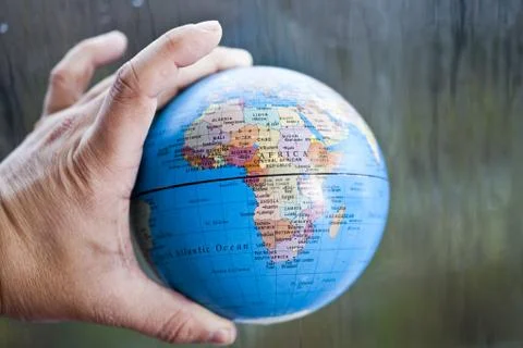 The earth in hands Stock Photos