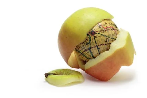 Earth inside apple Stock Photos