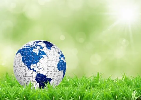 Earth lying on a green lawn Foto stock