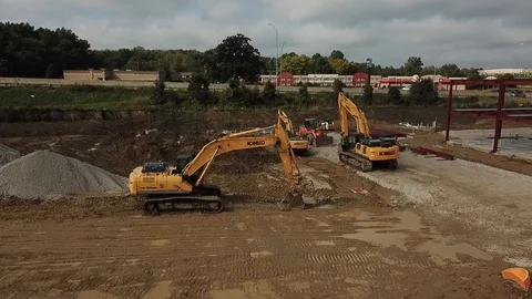 Earth Movers at Construction Site - drone shot Stock Footage 100306881