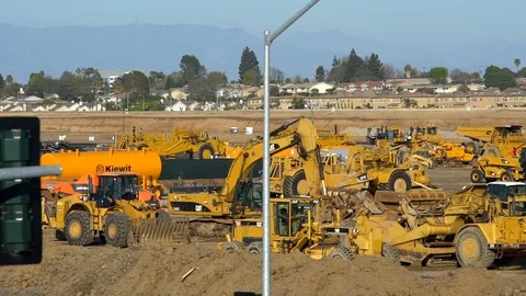 Earth movers at construction site Stock Footage 86220247