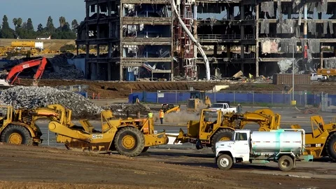 Earth movers at demolition site 스톡 동영상 86220239