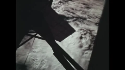 EARTH ORBIT - 1973: Orbital framework — Skylab 4 framework crosses cloud field Stock Footage 347864907