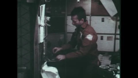 EARTH ORBIT - 1973: Shelf task — Skylab 3 immunology shelf handling Stock Footage 348025311