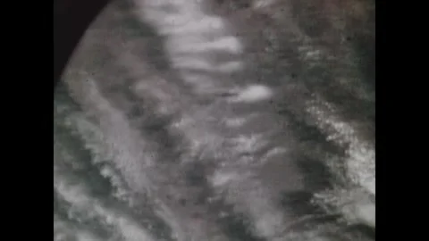 EARTH ORBIT - 1974: Cloud rows — Skylab 4 views aligned cloud patches Stock Footage 347863275