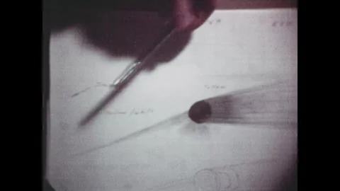 EARTH ORBIT - 1974: Sketch notes — Skylab 4 hand points beside comet diagram Stock Footage 348024700