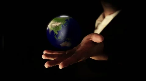 Earth rotating in hand Stock-Footage 40273177