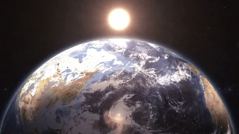 Earth rotating in space as the sun rises with bright flare 1 Видео 89508775