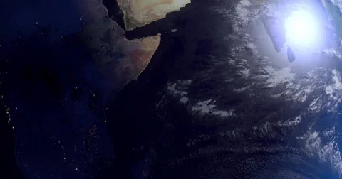 Earth rotating while camera zooming out from close up scene far away Stock Footage 80150955