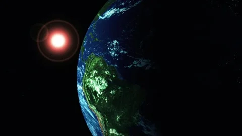 Earth seen from space with sunlight and lens flare against a dark background. Stock Footage 340382693