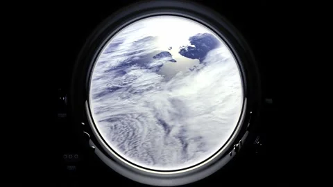 Earth as seen through window of spaceship, Flight Of The Space Station Above The Stock Footage 148109101