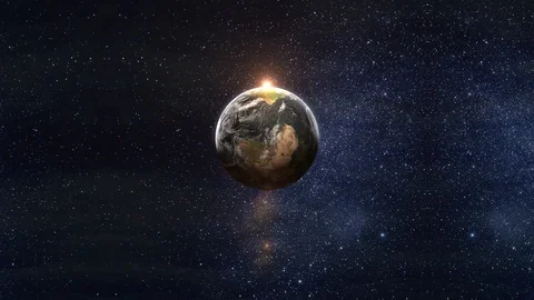The Earth slowly rotating in space, backlit by the sun Stock Footage 123153327