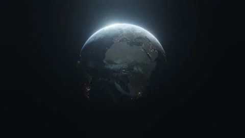 Earth slowly rotating in space, backlit by the sun with the lights of the planet Stock Footage 138248080