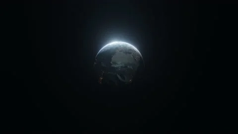 Earth slowly rotating in space, backlit by the sun with the lights of the planet Stock Footage 138248406