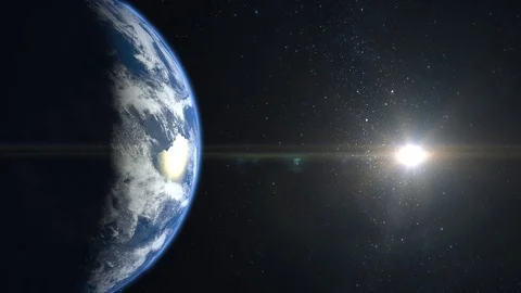 Earth from space. The camera flies forward near the Earth. Stars twinkle. Flight Stock Footage 103168576