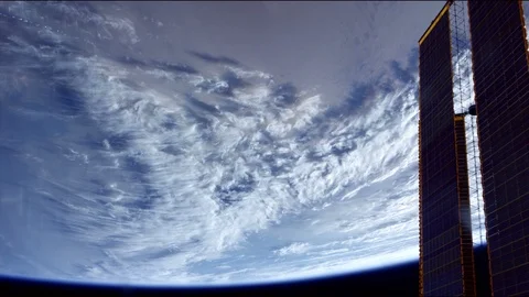 Earth from space with Internation Space Station solar array Stock Footage 101182993