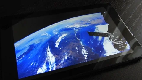 Earth from space on the tablet screen Stock Footage 80324865