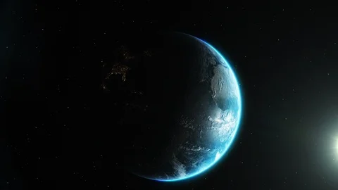 Earth spins slowly, the sun gently reveals more and more of the surface below. Stock Footage 103182678