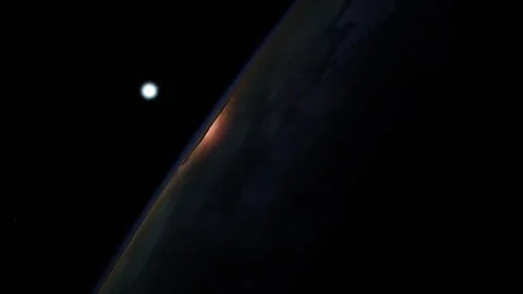 Earth sunrise space view thin glowing horizon light crest over planet soft shado Stock Footage 311648873
