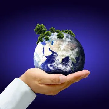 Earth with tree in hand Stock Photos
