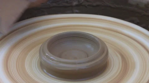 An earthenware dish on the potter's wheel Stock-Footage 35075942