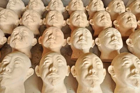 Earthenware human face Stock Photos