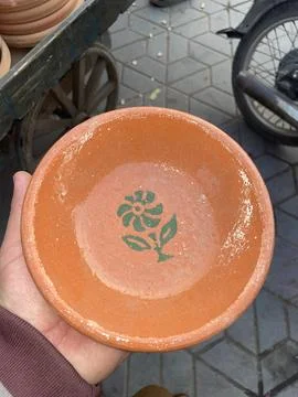 An earthenware plate is a rustic, handcrafted dish made from clay, adding c.. Stock Photos