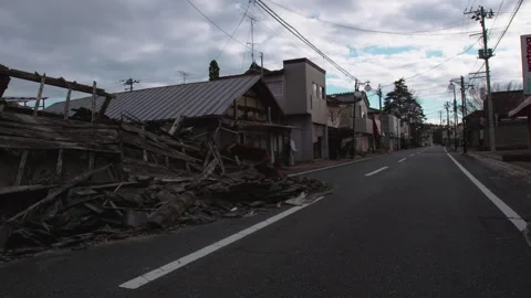 Earthquake Aftermath: Collapsed Building on a Deserted Japanese Street Stock Footage 336599050