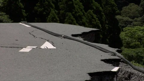 Earthquake damaged road Stock Footage 74024451