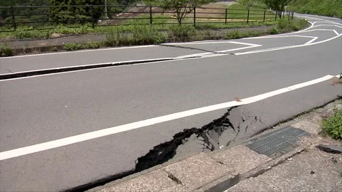 Earthquake damaged road Stock Footage 74024591