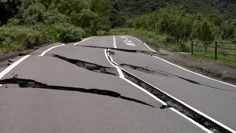 Earthquake damaged road Stock Footage 74024611