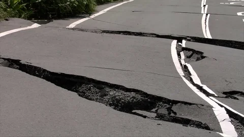 Earthquake damaged road Stock Footage 74024673